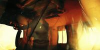 a blurry image of a man's face in a mirror
