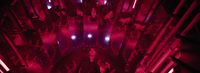 a large room with a lot of red lights