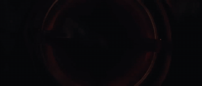 a dark picture of a toilet in a bathroom
