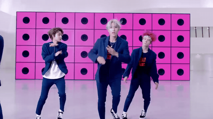 a group of young men standing next to each other