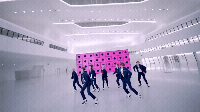 a group of people in a large room