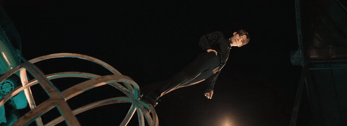 a statue of a man on top of a metal object