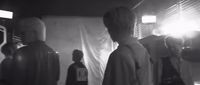 a group of people standing in a room