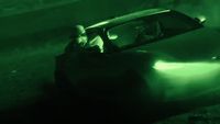 a car that is sitting in the dark