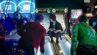 a group of people playing a video game