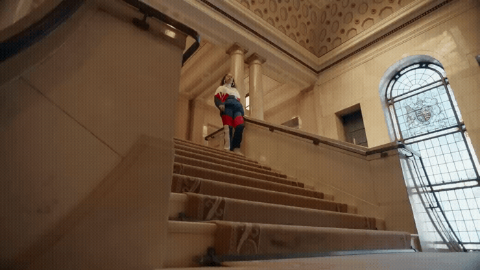 a person walking up a flight of stairs