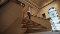 a person walking up a flight of stairs