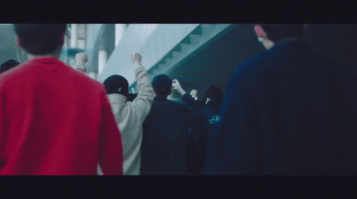 a group of people standing next to each other