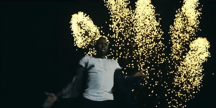 a man is standing in front of a large display of fireworks