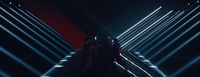a group of people standing in a dark tunnel