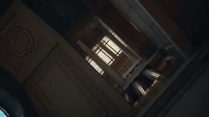 a room with a window and a clock on the wall
