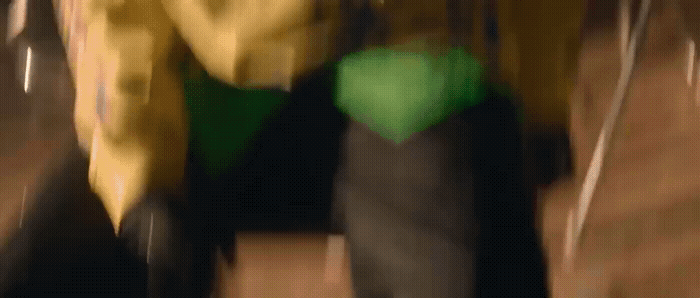 a blurry photo of a person walking down a street