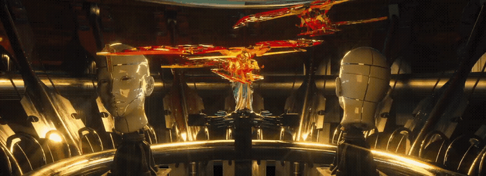 a large metal object in a dimly lit room