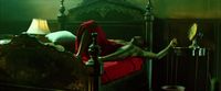 a person laying on a bed in a room