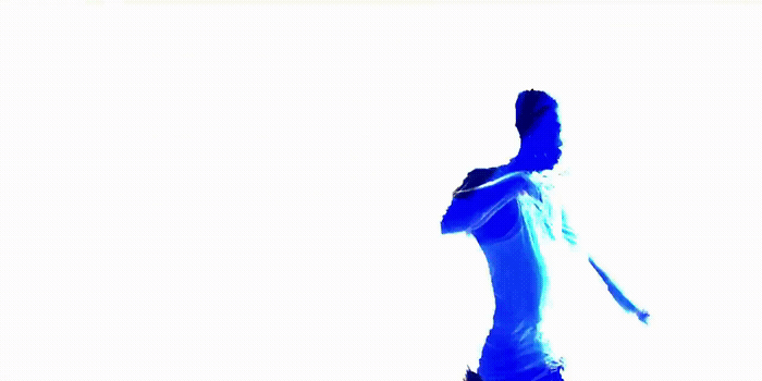 a silhouette of a man in a white shirt and tie
