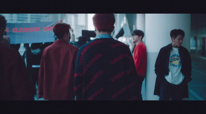a group of young men standing next to each other