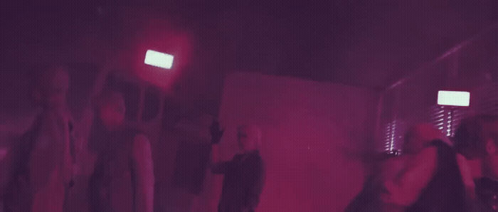 a group of people standing in a room