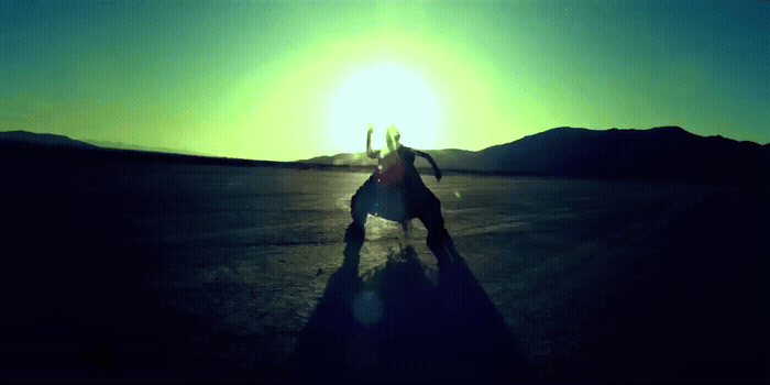 a person riding a skateboard on a flat surface