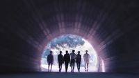a group of people standing in a tunnel