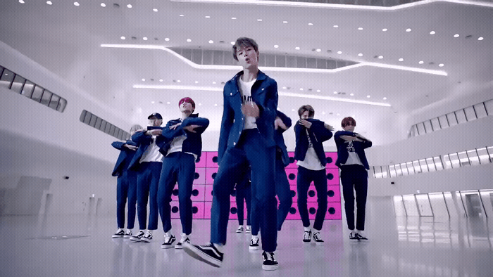 a group of young men standing next to each other