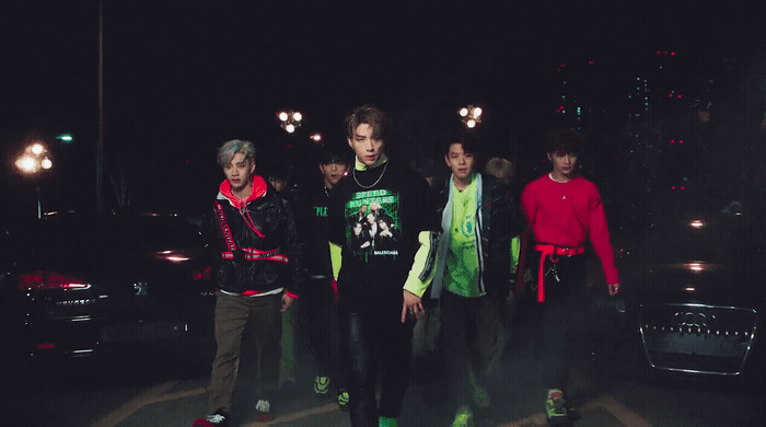 a group of young men standing next to each other