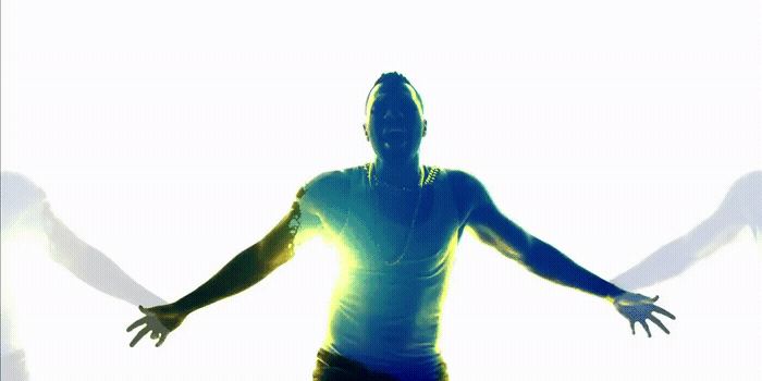 a person standing with their arms outstretched in the air