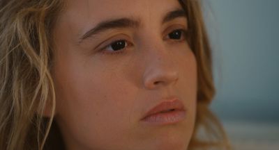 a close up of a person with long hair