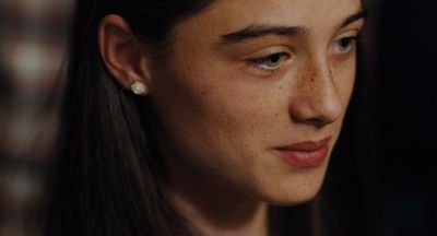 a close up of a person with long hair