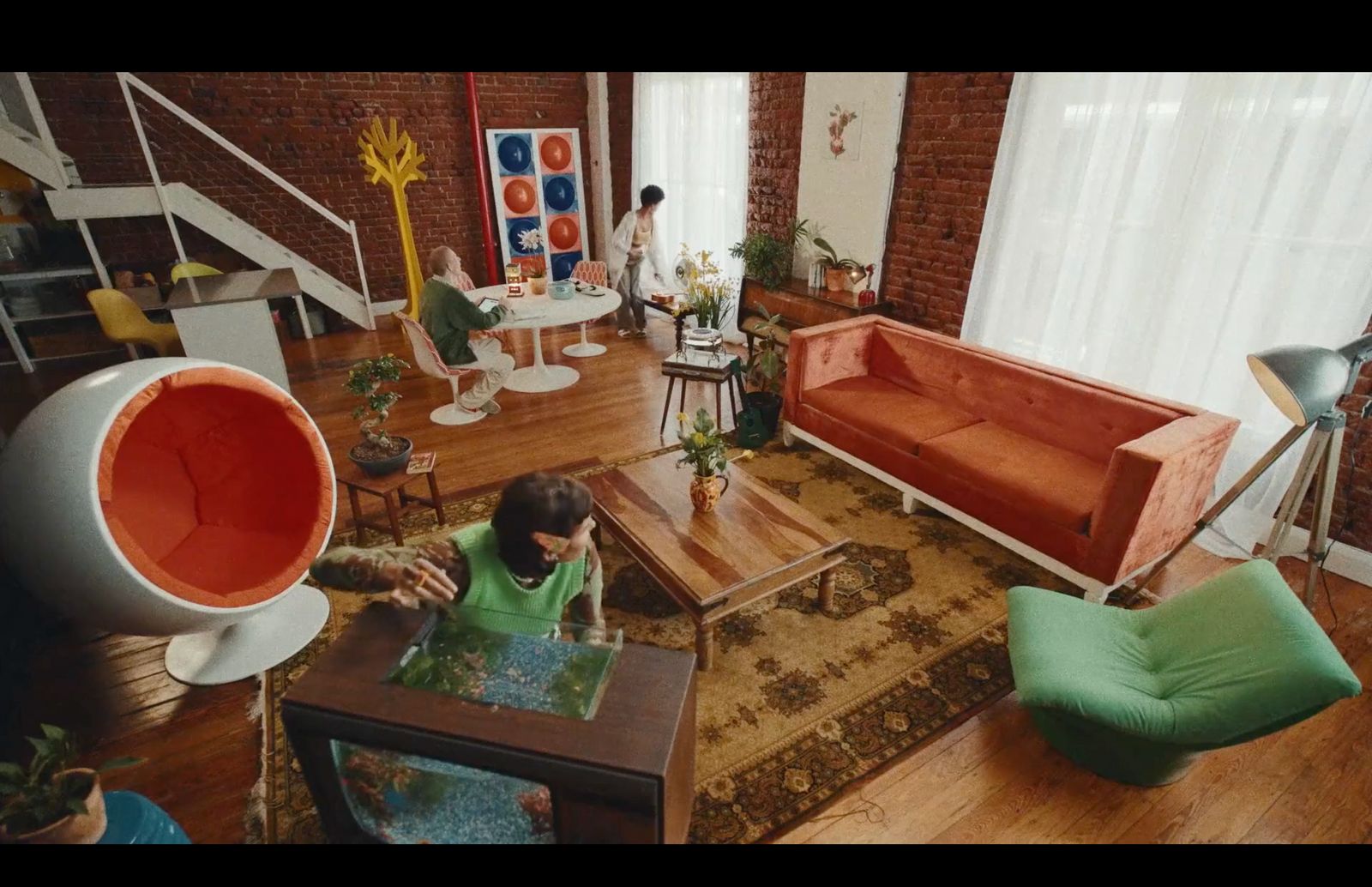 a woman sitting on a couch in a living room