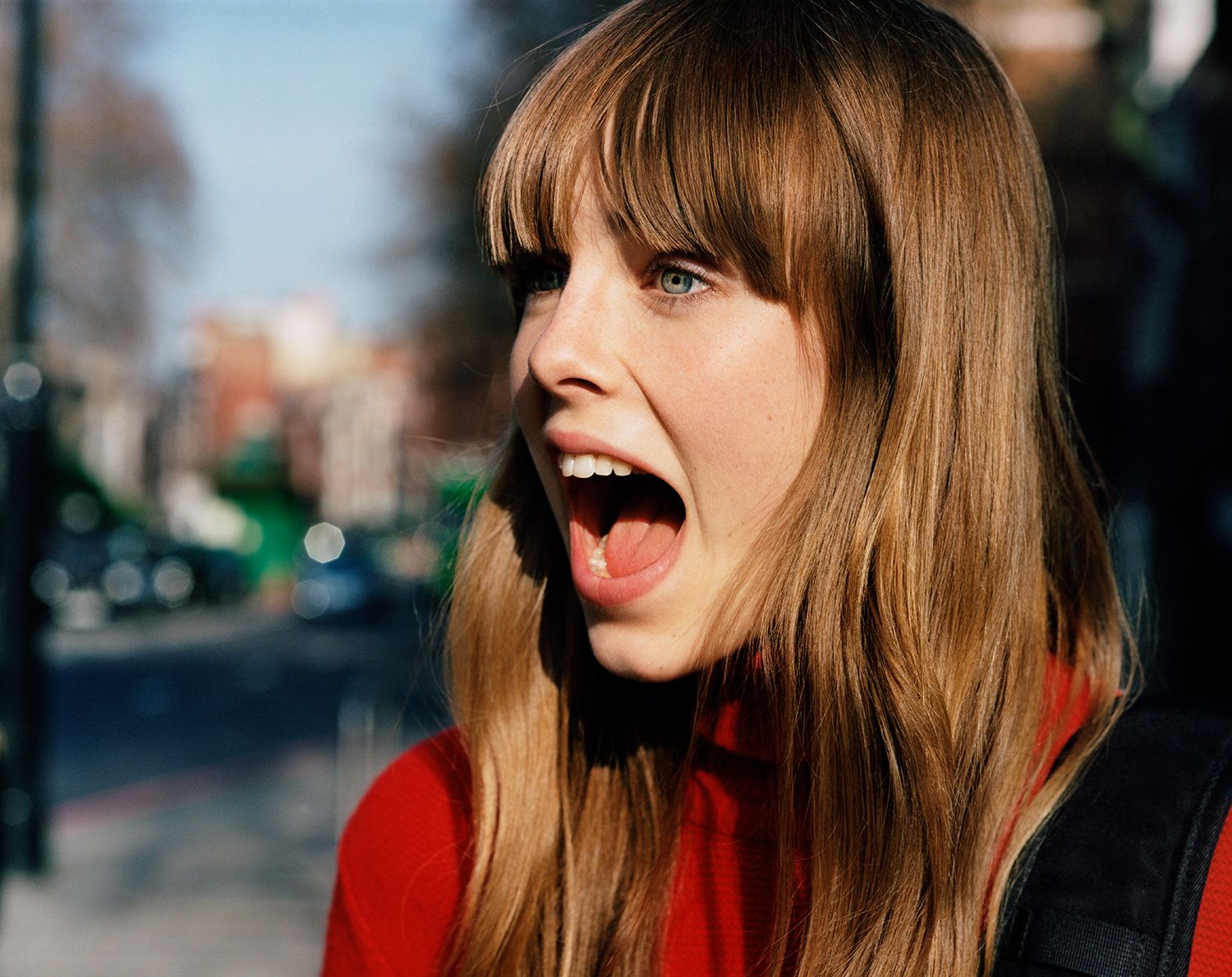 a woman with a surprised look on her face