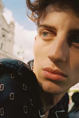 a close up of a person wearing a tie