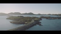 a large body of water surrounded by mountains