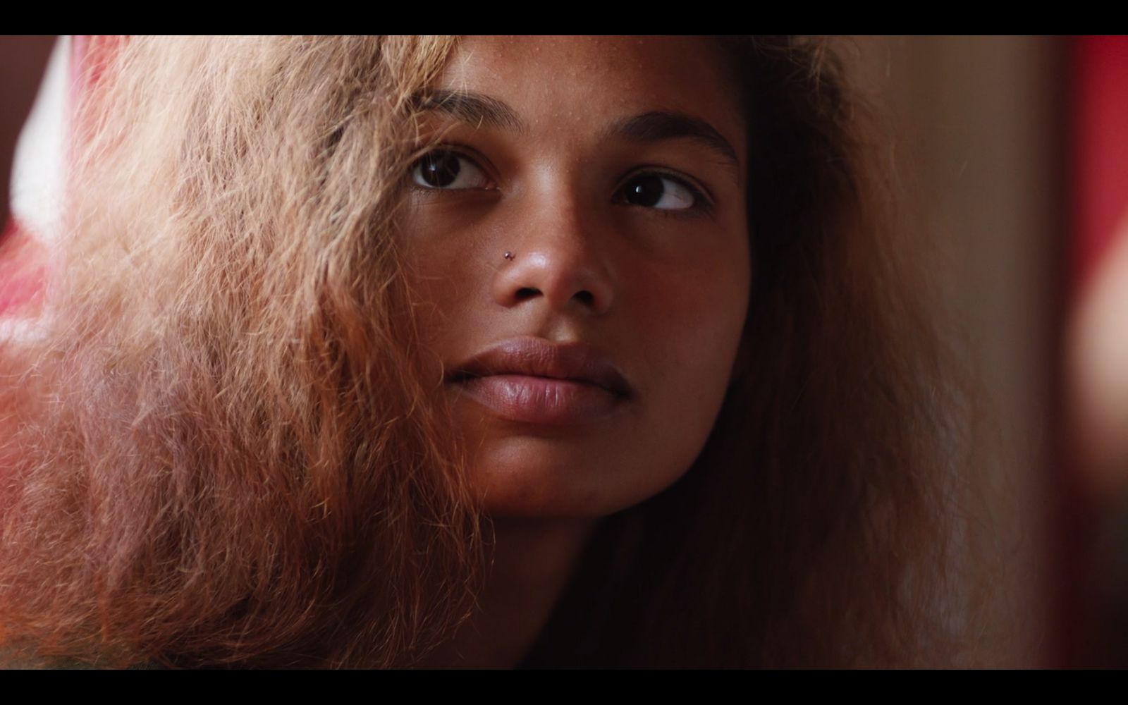 a close up of a woman with long hair