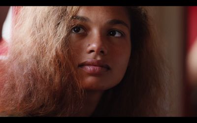 a close up of a woman with long hair