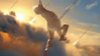 a man flying through the air while riding a skateboard