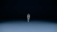 a person standing in the middle of a dark room