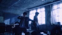 a couple of people standing in a room