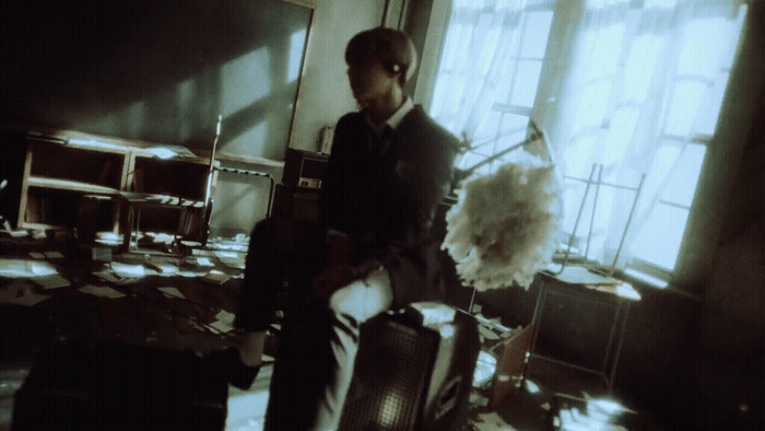 a man standing in a room with luggage