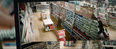 a man is shopping in a large store