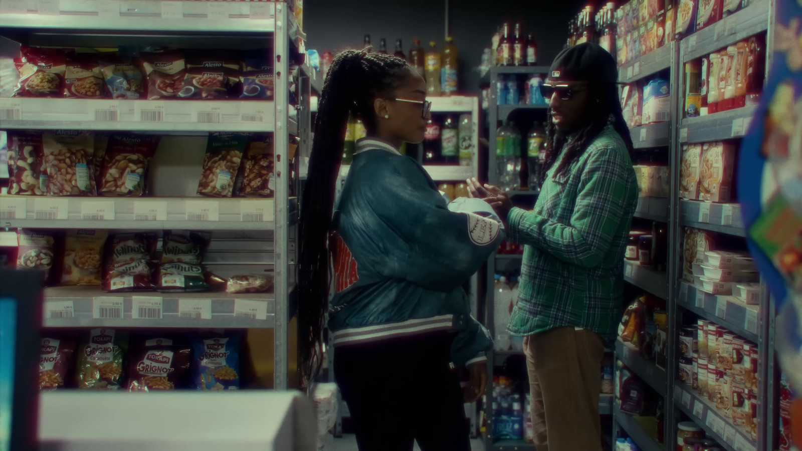 a couple of women standing in a store next to each other