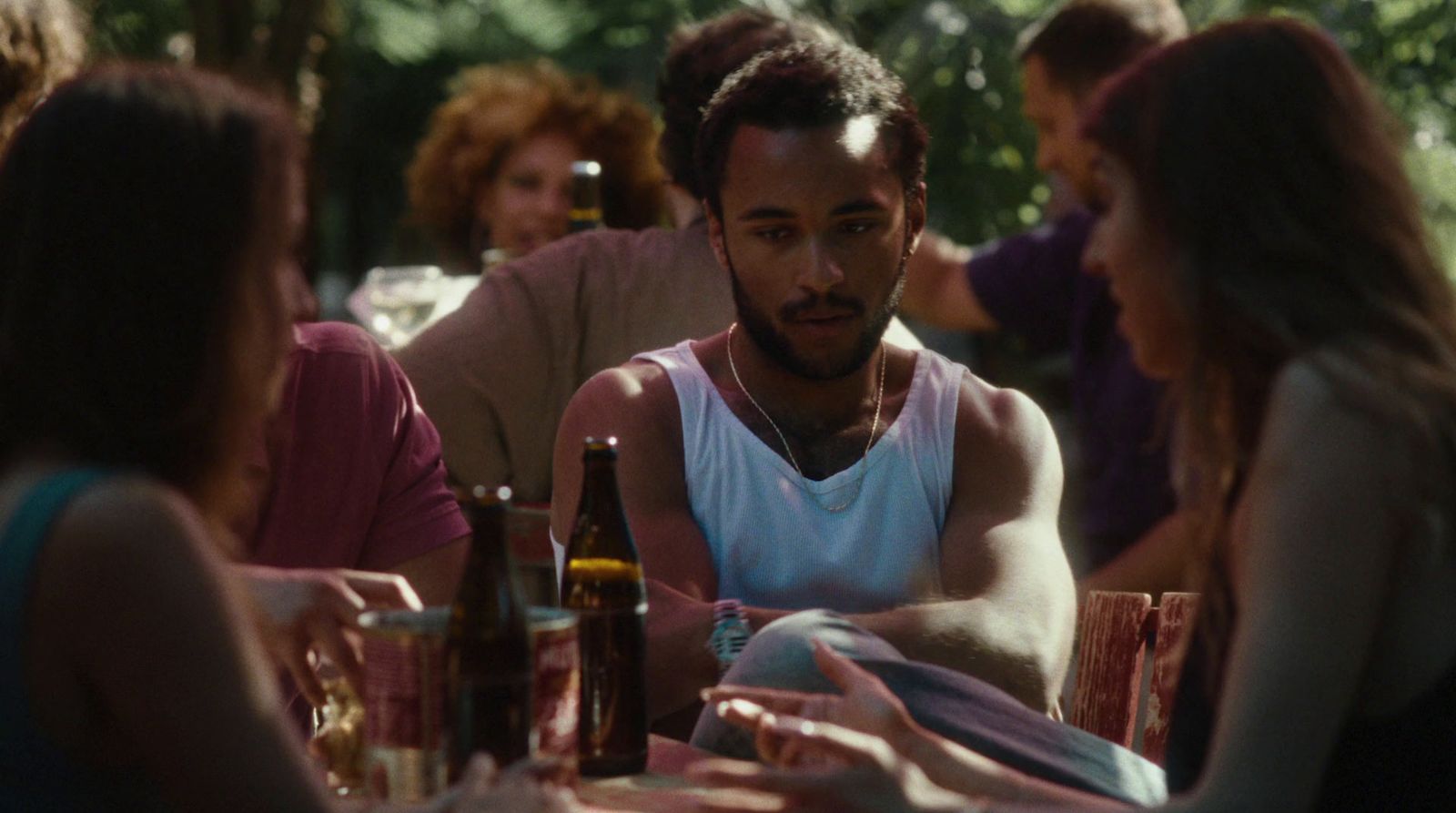 a group of people sitting around a table