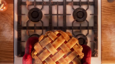 a pie sitting on top of a red chair