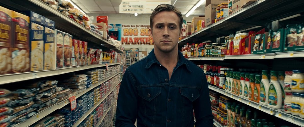 a man standing in a grocery store aisle