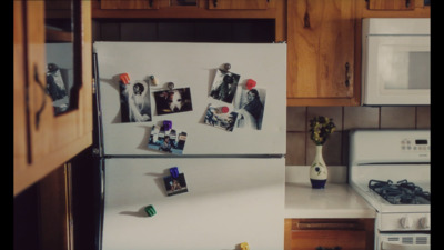 a white refrigerator freezer sitting inside of a kitchen