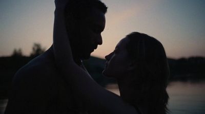 a man and a woman standing next to each other