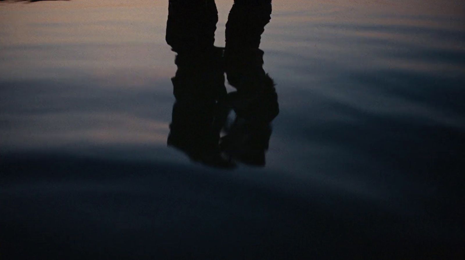 a person standing in a body of water