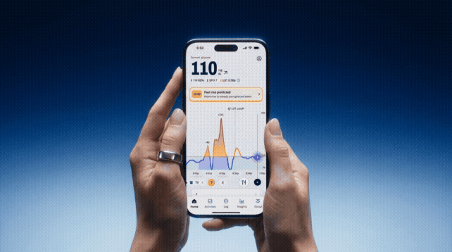 a person holding a cell phone in their hands