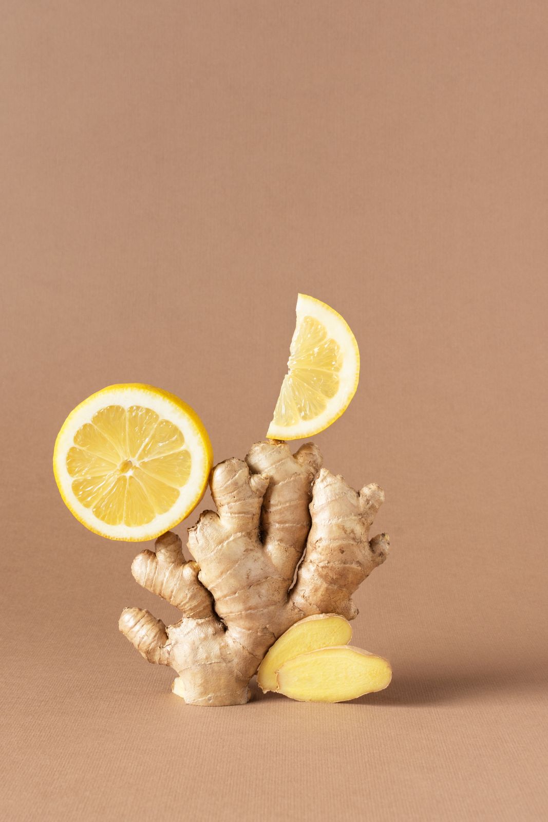 a couple of lemons and a ginger on a table