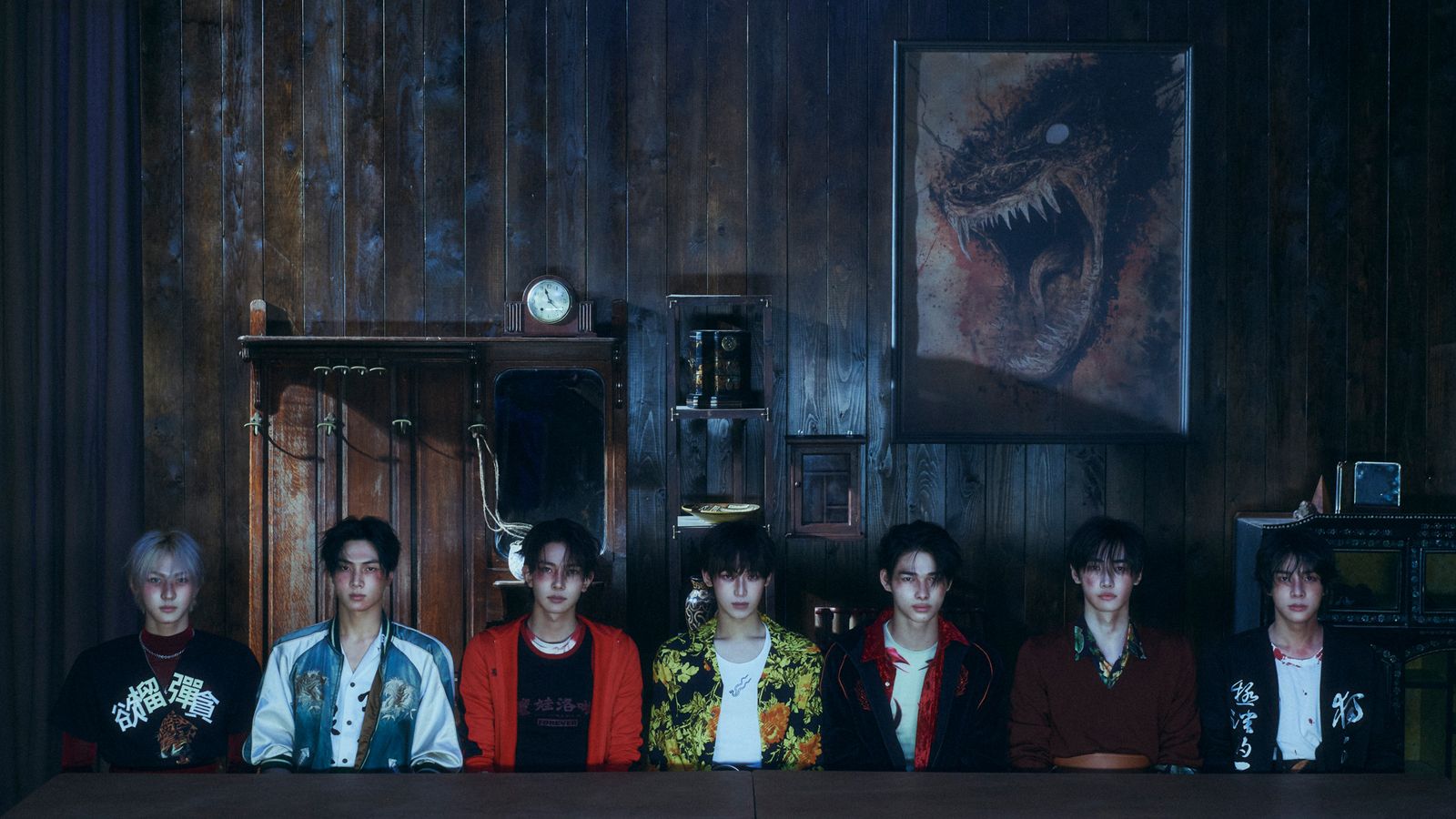 a group of young men sitting next to each other