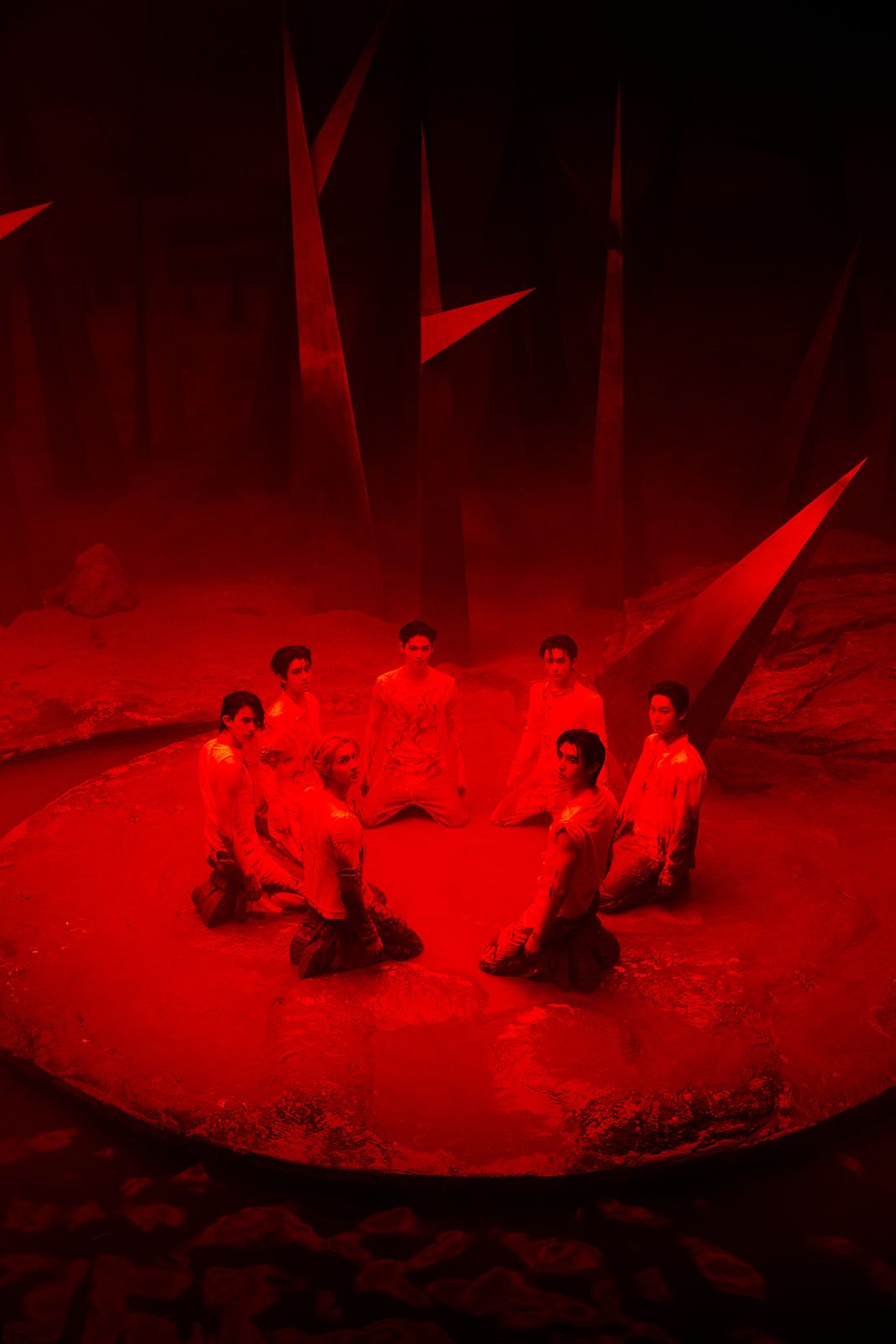 a group of people sitting on top of a red floor